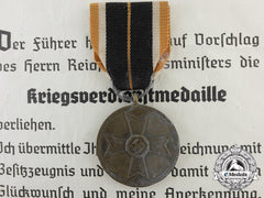 A War Merit Medal With Award Document 1943