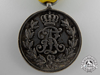 a_saxon_friedrich_august_medal;_silver_grade_with_packet_a_4041_1