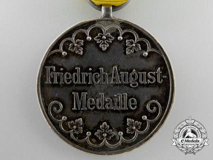 a_saxon_friedrich_august_medal;_silver_grade_with_packet_a_4042_1