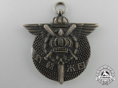 An Imperial Japanese Silver Baseball League Medal