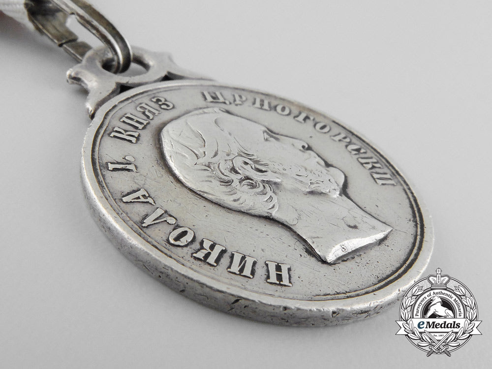 montenegro._a_scarce1862_heroism_medal_by_v._mayer_a_7113