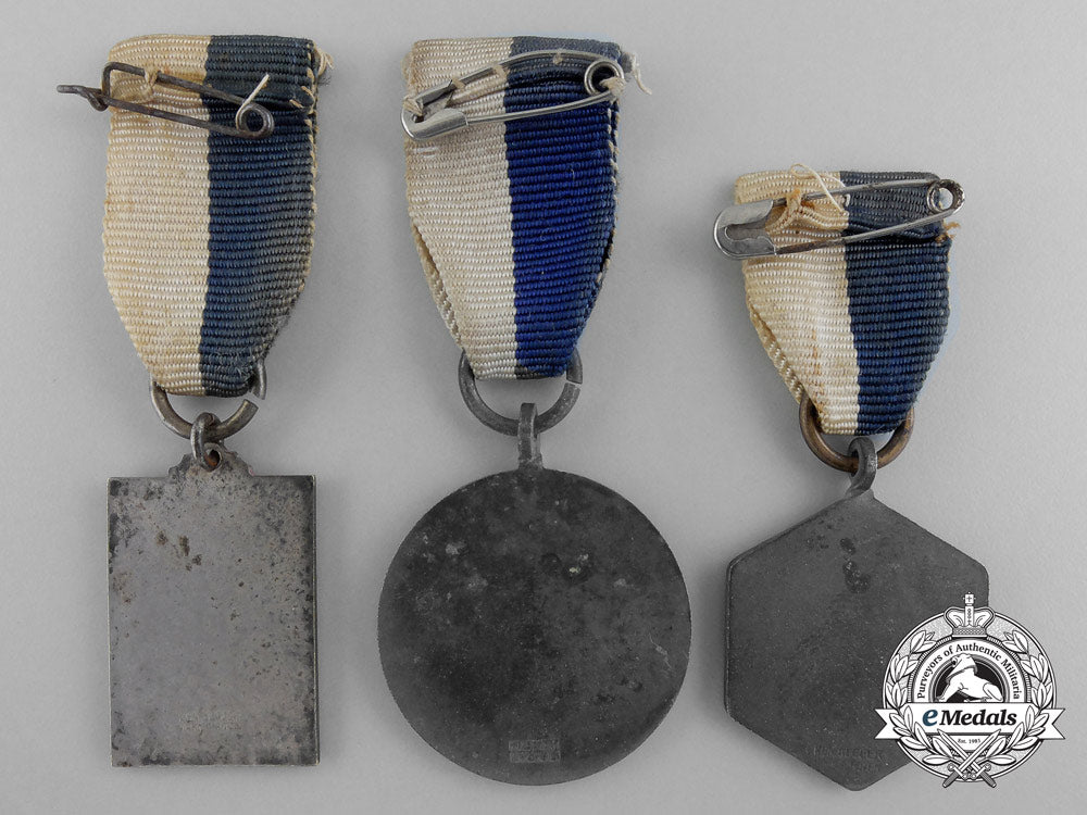 three_second_world_war_era_royal_dutch_touring_club_travellers'_association_medals_a_7915