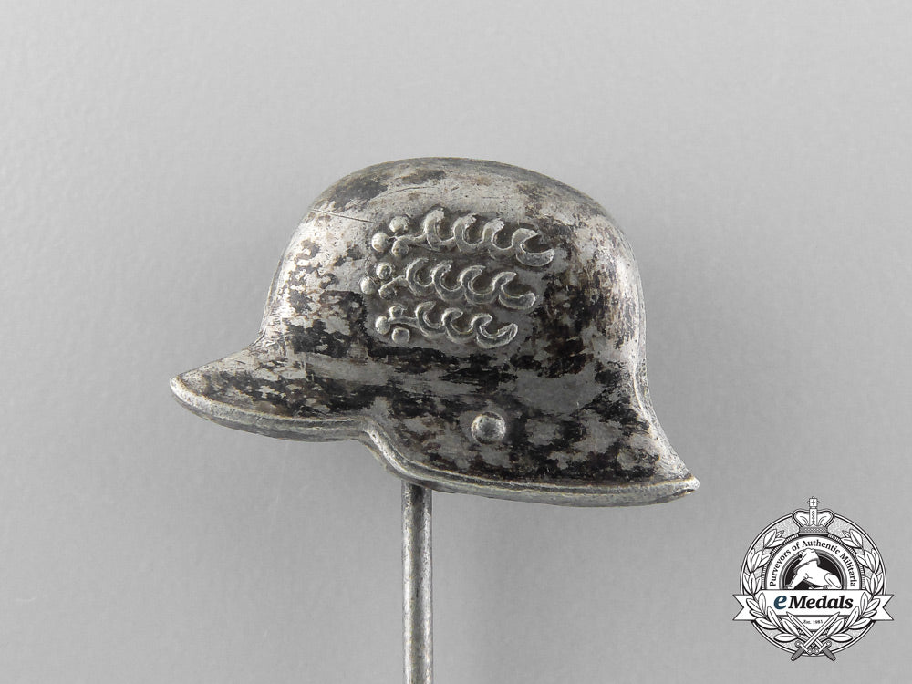 two_german_stehlhelm_veteran_badges_a_9376
