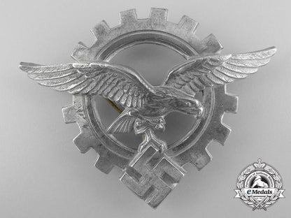 a_generalluftzeugmeister(_civilian_technician's)_officers's_visor_cap_insignia_a_9390