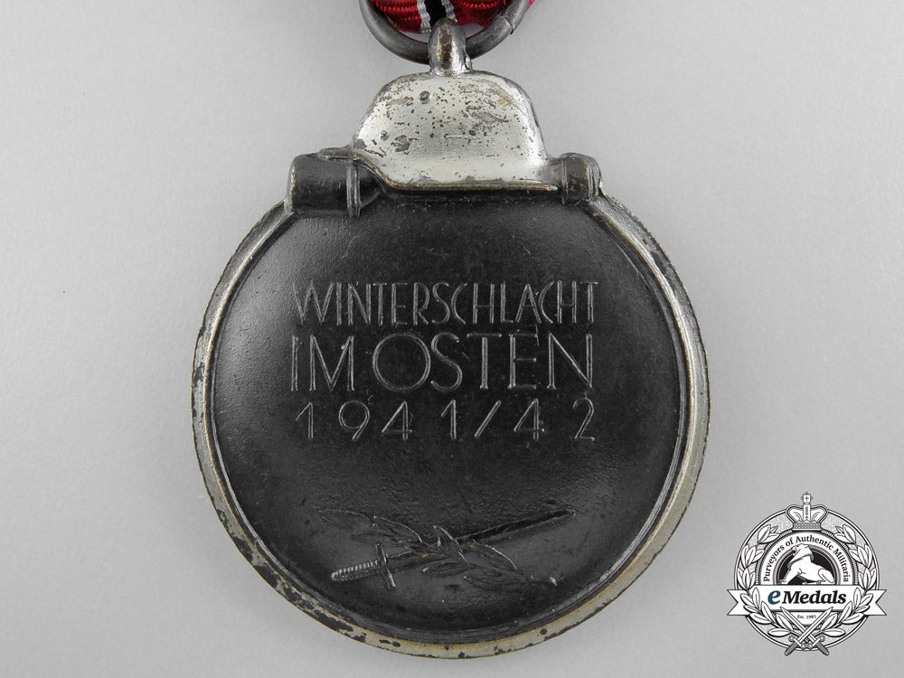 a_mint_east_medal_with_packet_by_carl_wild_a_9860
