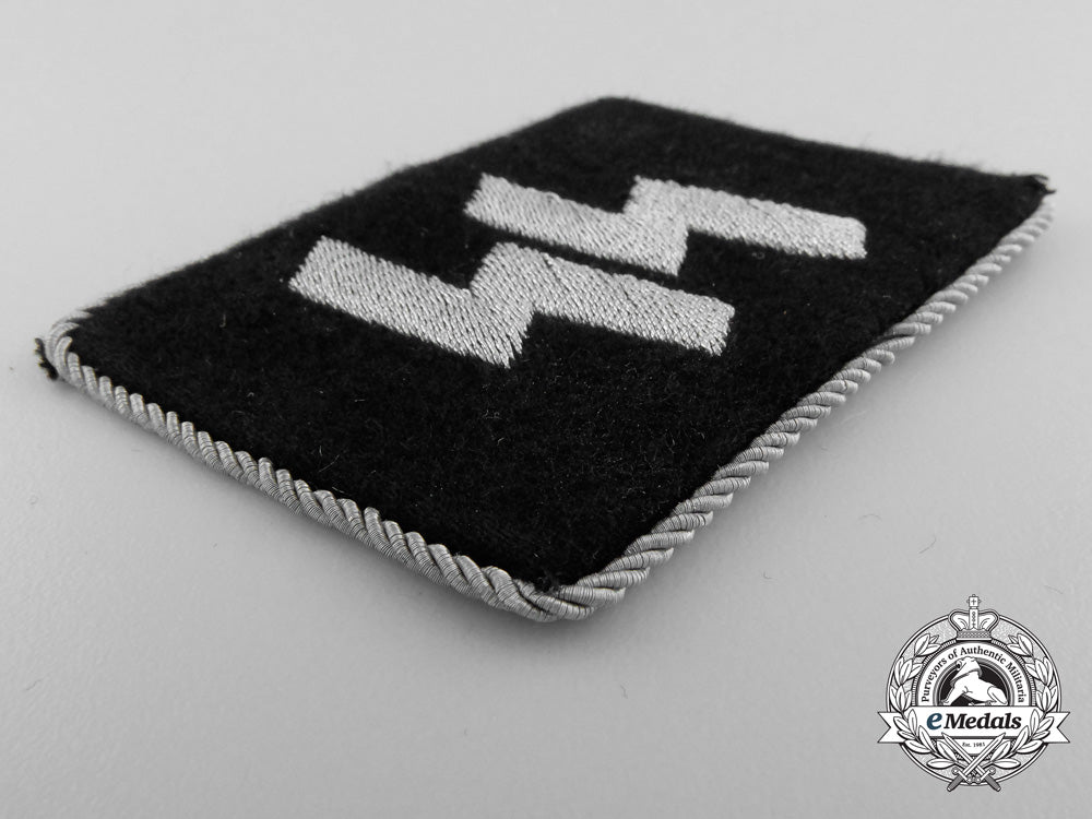 an_officer's_ss_collar_tab_and_dachau_clothing_work_factory_letter_a_9897