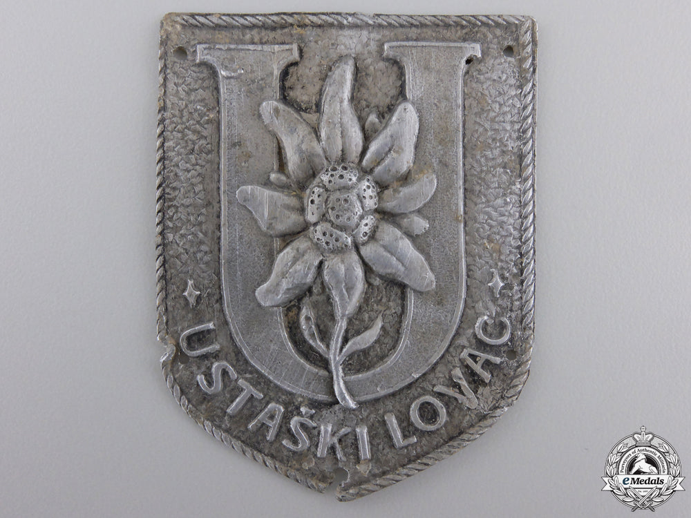 a_ustaski_lovac_arm_badge_of_the_ustasha_rifleman's_brigade_a__ustaski_lovac_55b66af92d48a