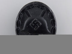 A Black Grade German Wound Badge By Wilhelm Deumer