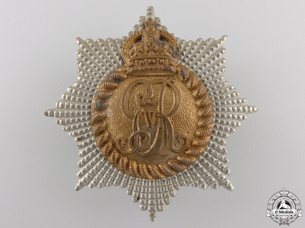 a_first_war_royal_canadian_regiment_cap_badge_a_first_war_roya_555f4d0d06e00