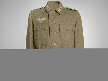 a_german_m44_combat_tunic_with_printed_eagle_a_german_m44_com_55ad013ce80eb