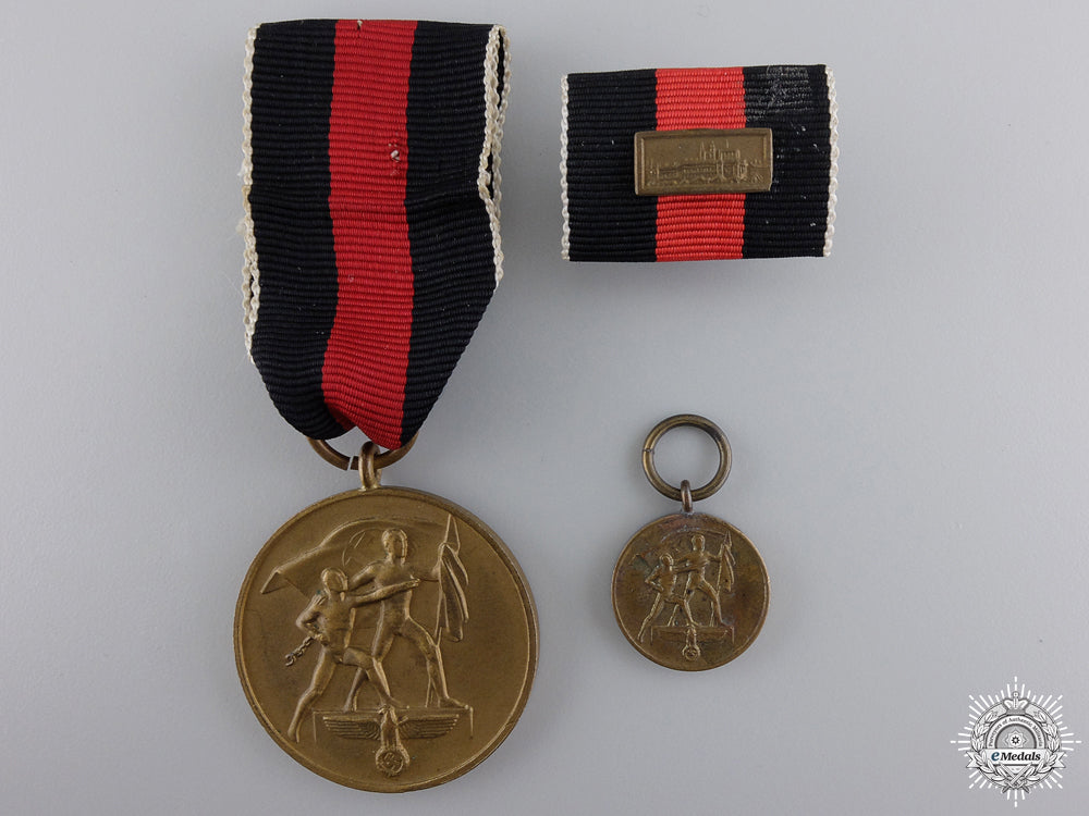 a_german_oktober1938_medal_with_ribbon_bar_and_miniature_a_german_oktober_548f140f20561