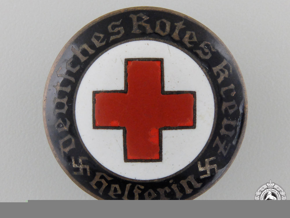 a_german_red_cross_badge_a_german_red_cro_5564b7587a5a6