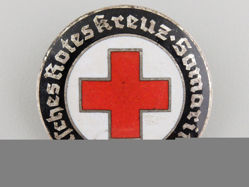 a_german_red_cross_volunteer's_badge_a_german_red_cro_558822cb3dbd3