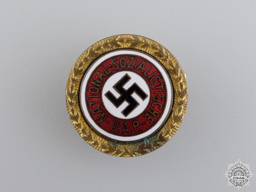 a_golden_party_badge_issued_to_max_held1934_a_golden_party_b_5479f889cc081