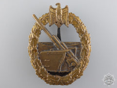 A Kreigsmarine Naval Artillery Badge By Juncker