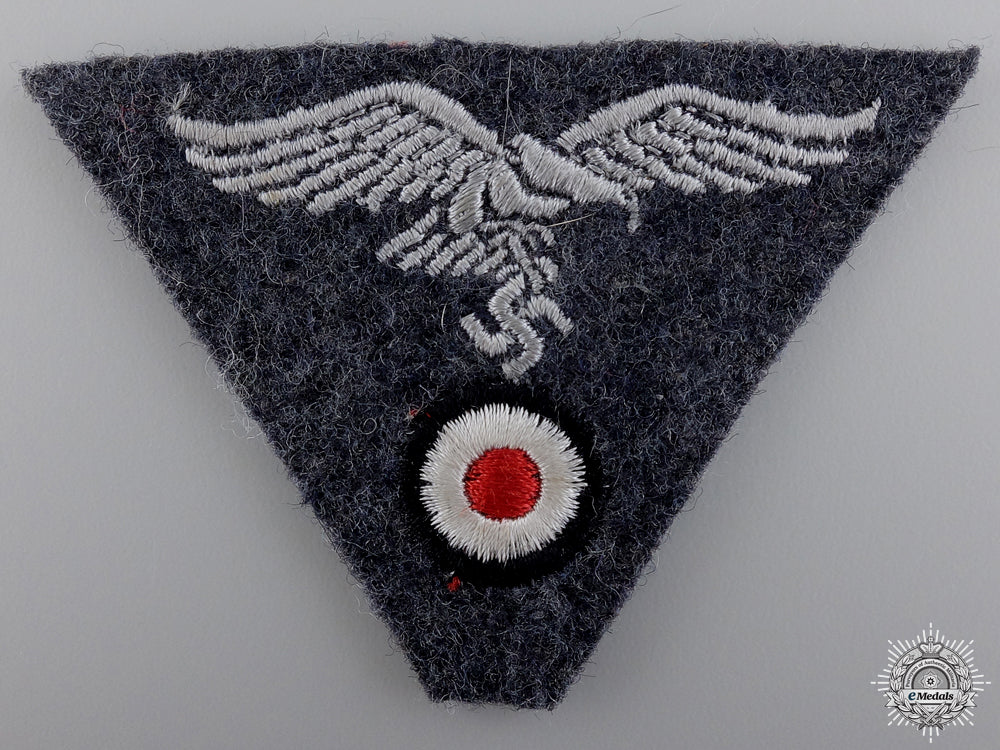 a_luftwaffe_em/_nco’s_m43_trapezoid_cap_insignia_a_luftwaffe_em_n_54bd19a063c6f