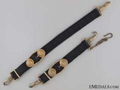 A Matching Set Of Naval Dagger Hangers