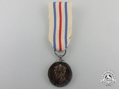 a_miniature_king's_medal_for_service_in_the_cause_of_freedom_a_miniature_king_55cc9ee5c5ade
