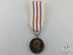 A Miniature King's Medal For Service In The Cause Of Freedom