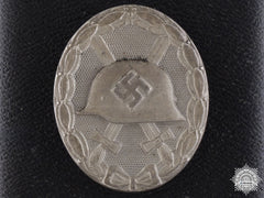 A Mint Silver Grade Wound Badge With Case