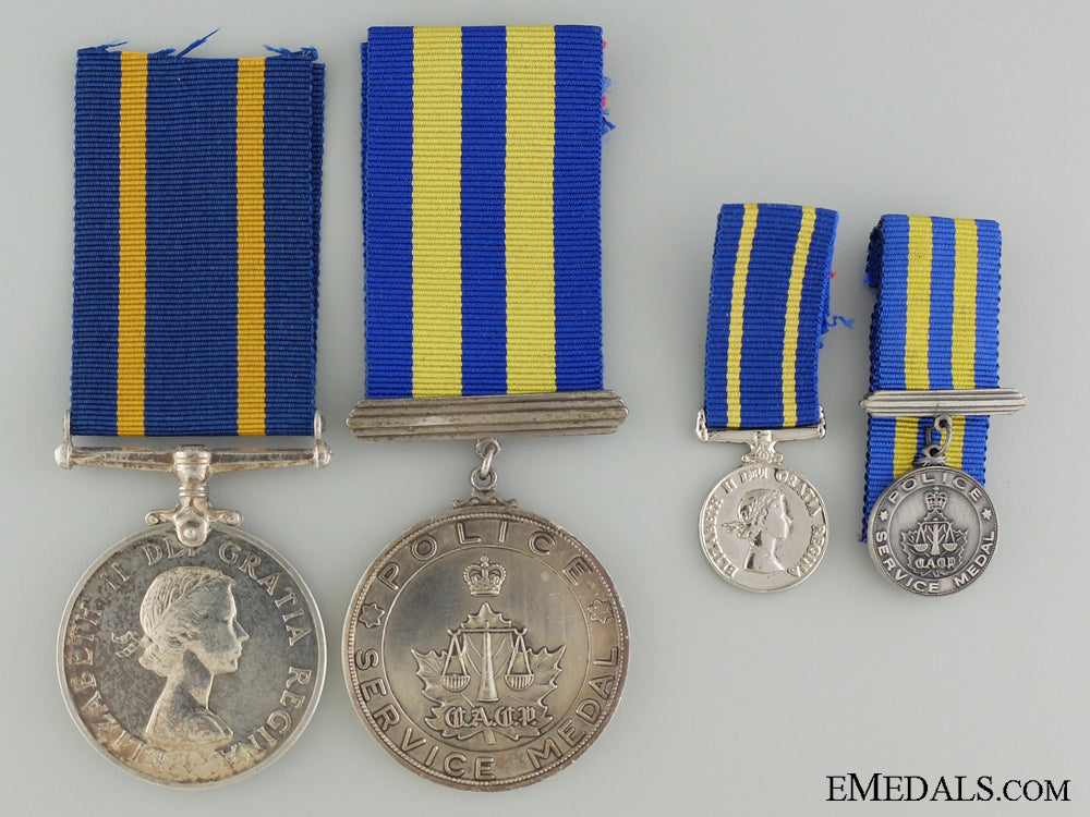 canada._a_royal_canadian_mounted_police_long_service_pair_to_f.j.w._sauriol_a_royal_canadian_539746a7629f4