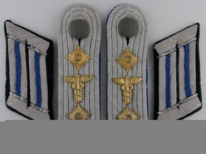 a_set_of_army_medical_hauptmann_boards&_collar_tabs_a_set_of_army_me_552c06dcbf64b