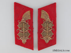 A Set Of Matching Army Collar Tabs