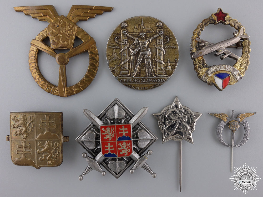 a_set_of_seven_czechoslovakian_badges_and_insignia_a_set_of_seven_c_54dbafce546bb