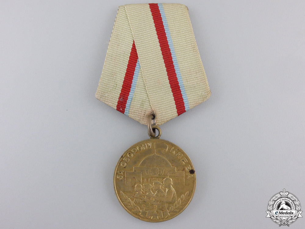 a_soviet_medal_for_the_defence_of_kiev_a_soviet_medal_f_559bc84ee31f3