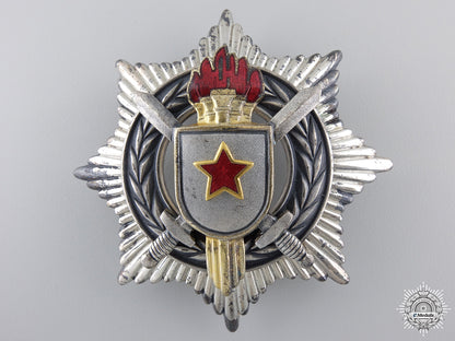 a_yugoslavian_order_of_military_merit;3_rd_class_with_swords_a_yugoslavian_or_550ae5e86ac6c