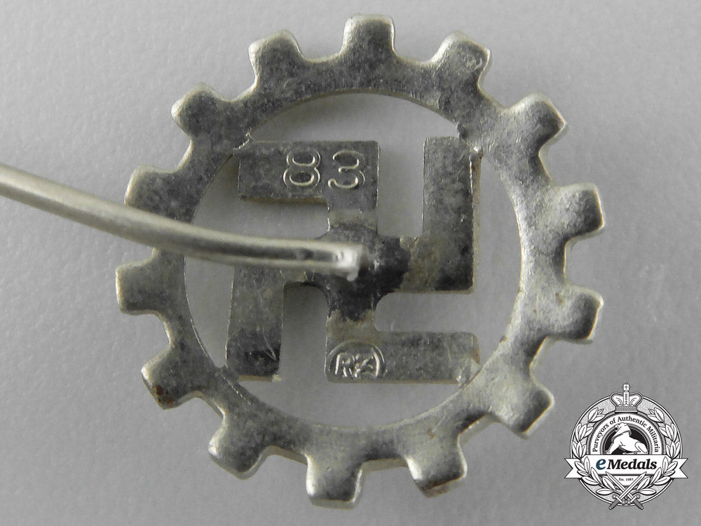 a_grouping_of_two_daf(_german_labour_front)_membership_badges_and_stick_pins_aa_3131