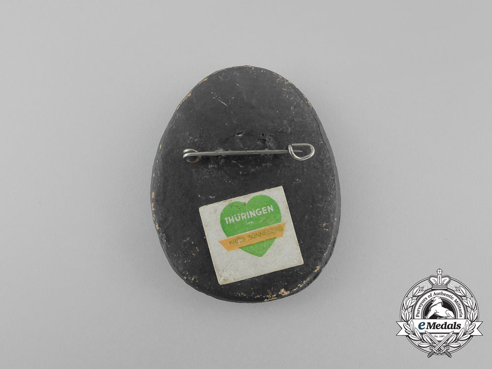 a1934/35_whw(_winter_relief_of_the_german_people)_donation_badge_aa_5546