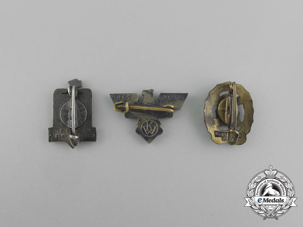 a_grouping_of_three_second_war_german_badges_aa_6521