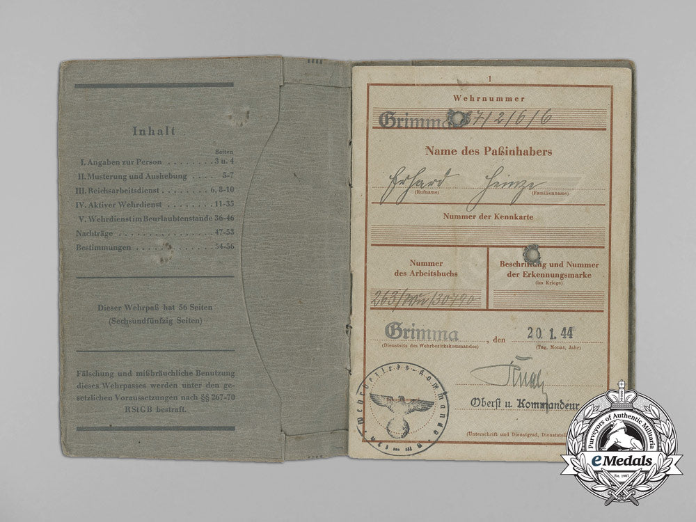 a_group_of_id_books_to_homeland_flak_helper_erhard_heinze_aa_7129
