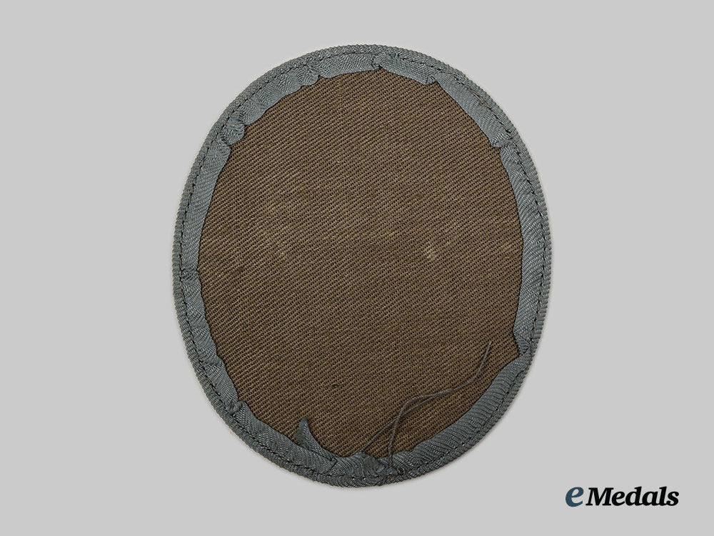 germany,_ordnungspolizei._a_schutzpolizei_officer’s_sleeve_eagle_ai1_8541_1