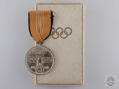 An 1936 Berlin Summer Olympic Games Medal; Cased