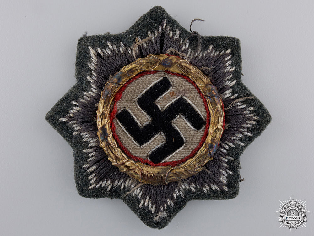 an_army_issue_german_cross_in_gold;_cloth_version_an_army_issue_ge_54dd08789bbd3