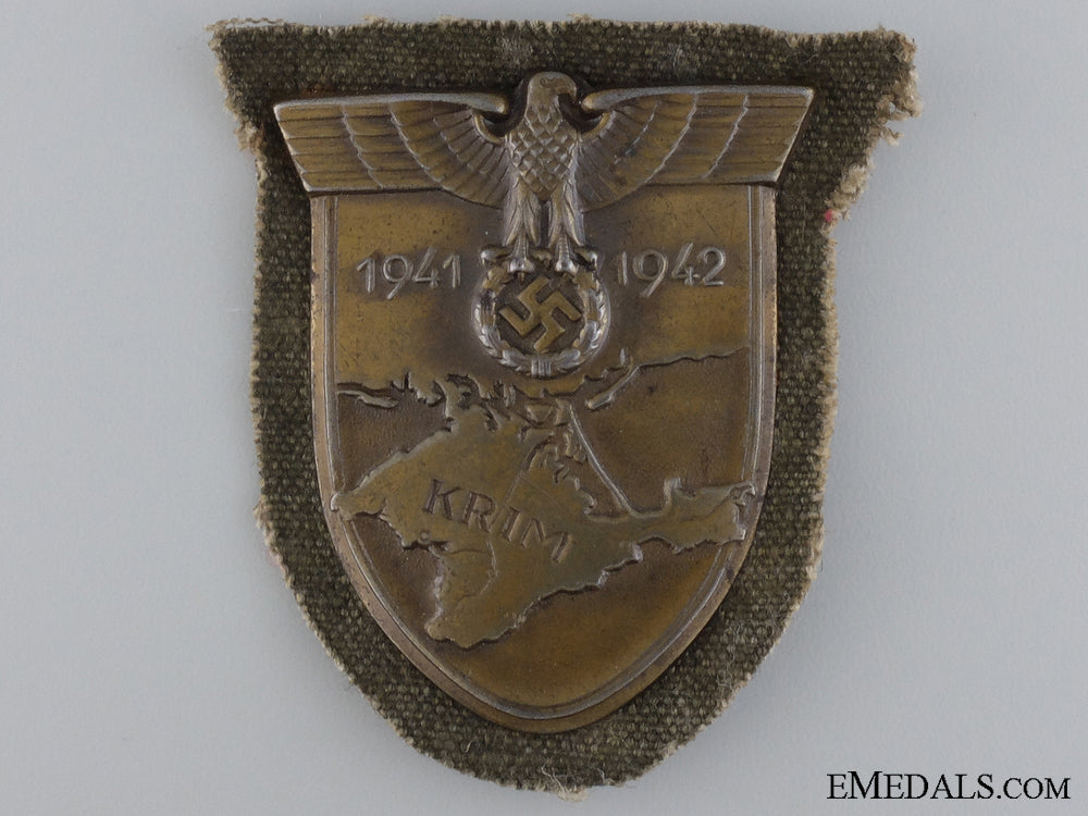 an_army_issued_krim_shield_on_canvas_an_army_issued_k_5453afddec5f7