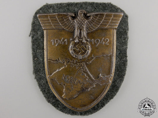 an_army_issued_krim_campaign_shield_an_army_issued_k_557f24b7ed936