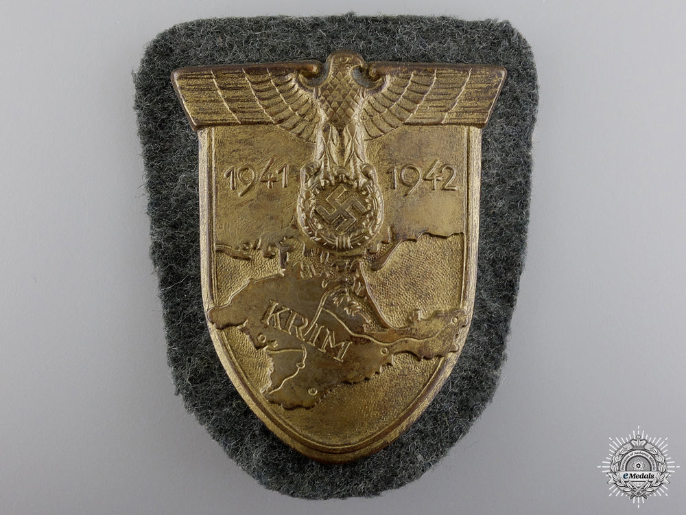 an_army_issued_vaulted_krim_campaign_shield_an_army_issued_v_54a2fa92e9a44