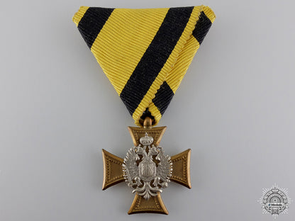 an_austrian_military_long_service_decoration;_mother_of_pearl_backing_an_austrian_mili_54a6d28a32c73