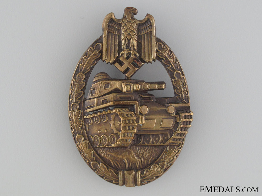 an_early_bronze_grade_tank_badge;_karl_wurster_an_early_bronze__535682267b964