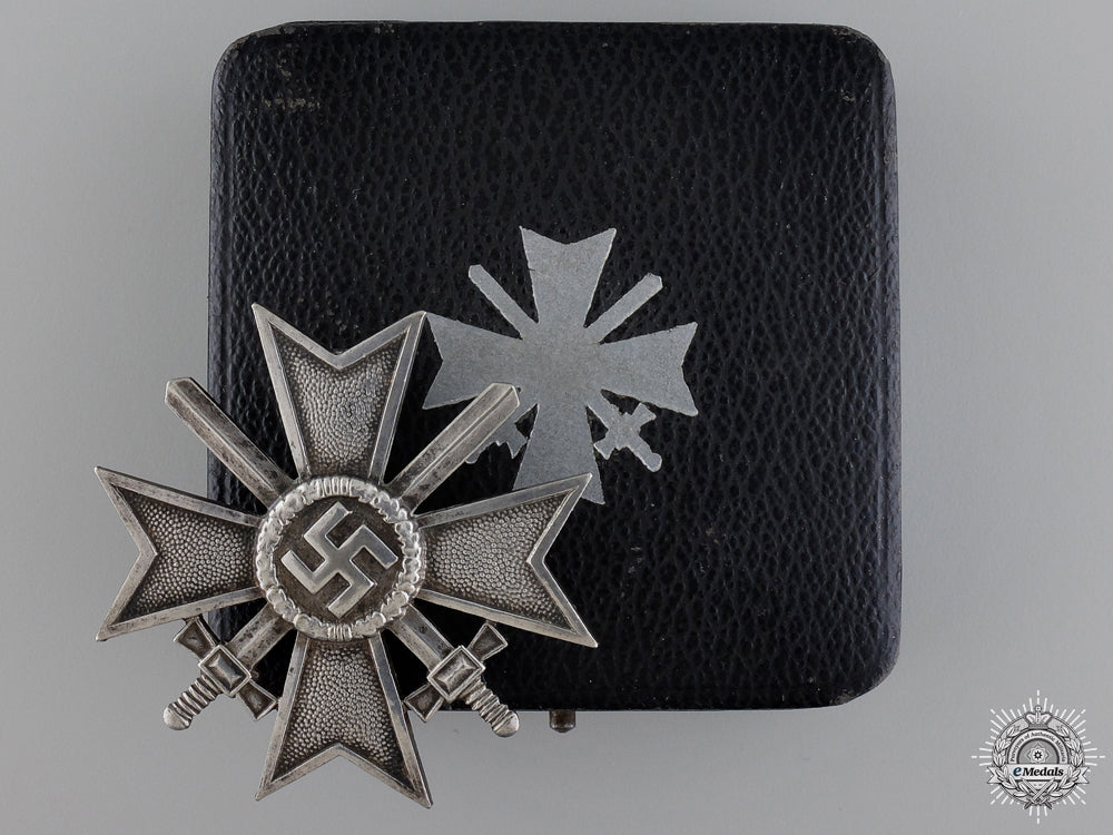 an_early_cased_first_class_war_merit_cross_with_swords_an_early_cased_f_54bd1fc148679
