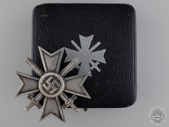 An Early Cased First Class War Merit Cross With Swords