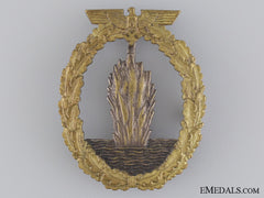 An Early War Kriegsmarine Mine Sweeper Badge