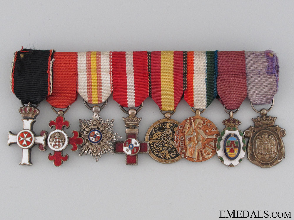 an_eight_piece_spanish_miniature_group_an_eight_piece_s_52a7655291bc8