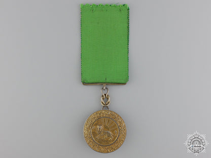an_iranian_order_of_homayoun;_gold_grade_medal_an_iranian_order_5494483fae42a