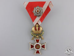 An Order Of Leopold Knights Cross In Gold With War Decoration