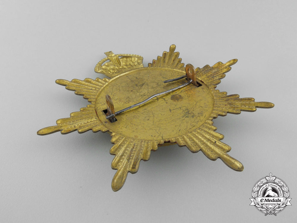 a57_th_regiment(_peterborough_rangers)_canadian_militia_helmet_plate_c.1908_b_205