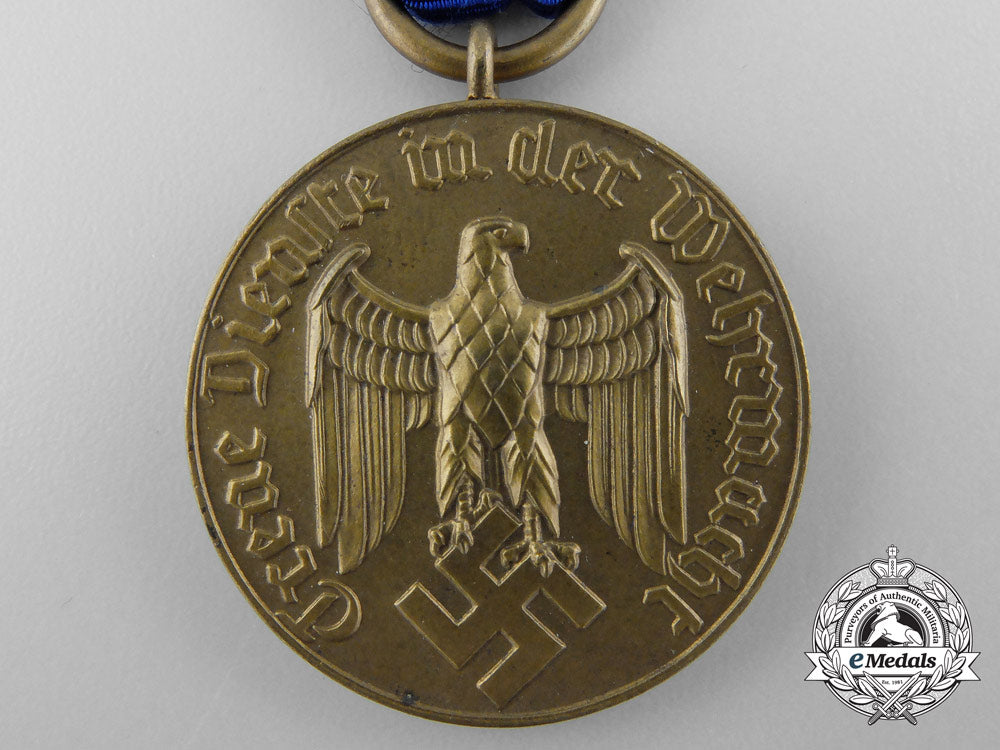 a_wehrmacht_long_service_award;3_rd_class_medal_for_twelve_years'_service_b_3303